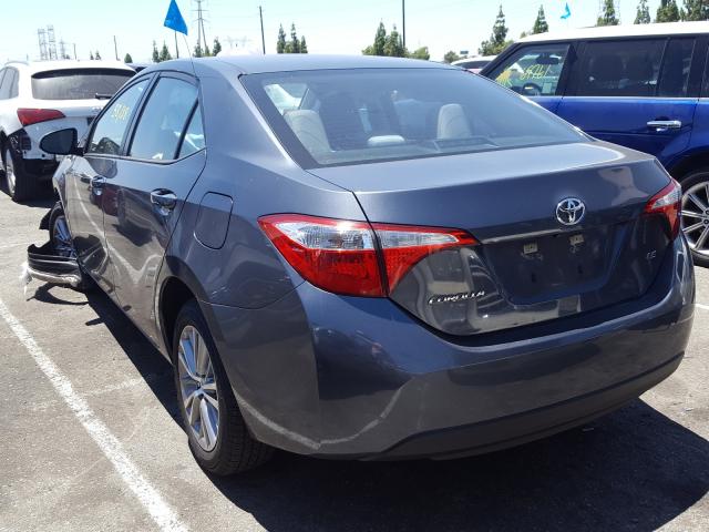 Photo 2 VIN: 5YFBURHE2FP303488 - TOYOTA COROLLA L 