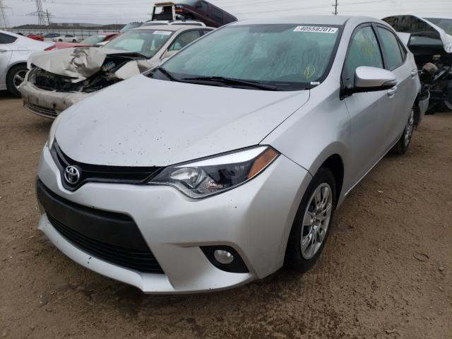 Photo 1 VIN: 5YFBURHE2GP415211 - TOYOTA COROLLA L 