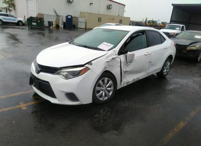 Photo 1 VIN: 5YFBURHE2GP506690 - TOYOTA COROLLA 