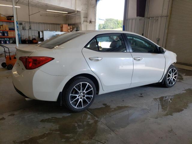 Photo 2 VIN: 5YFBURHE2HP591693 - TOYOTA COROLLA L 