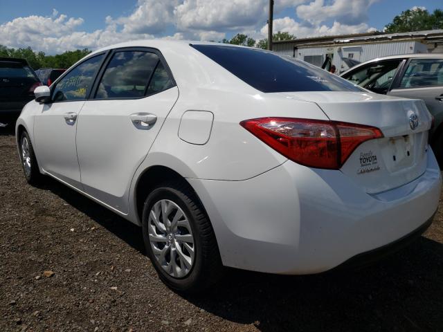 Photo 2 VIN: 5YFBURHE2HP600568 - TOYOTA COROLLA L 