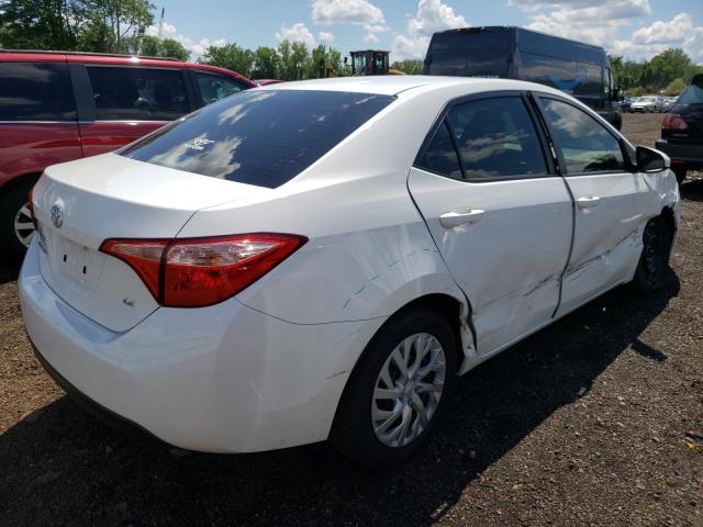 Photo 3 VIN: 5YFBURHE2HP600568 - TOYOTA COROLLA L 