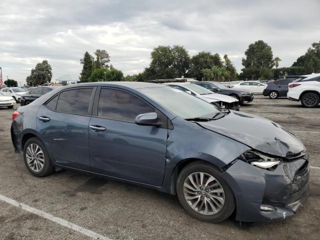 Photo 3 VIN: 5YFBURHE2HP604555 - TOYOTA COROLLA L 