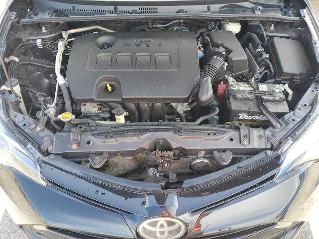 Photo 10 VIN: 5YFBURHE2HP619458 - TOYOTA COROLLA L 