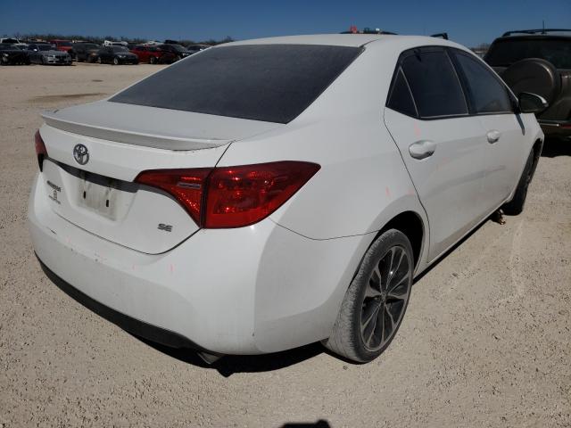 Photo 3 VIN: 5YFBURHE2HP623011 - TOYOTA COROLLA L 