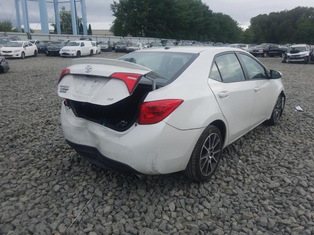 Photo 3 VIN: 5YFBURHE2HP634297 - TOYOTA COROLLA L 