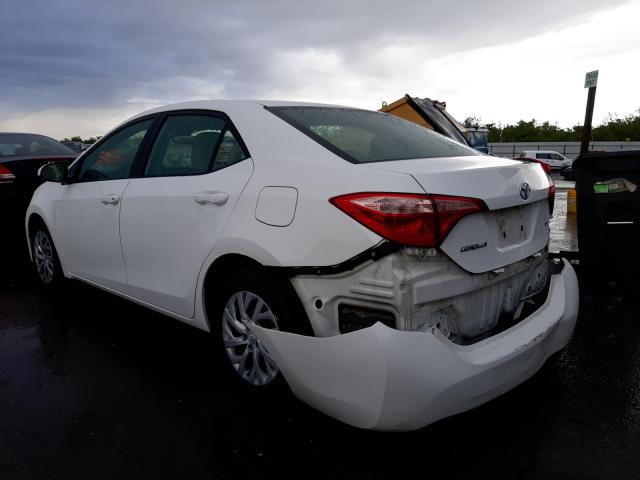 Photo 2 VIN: 5YFBURHE2HP635871 - TOYOTA COROLLA L 