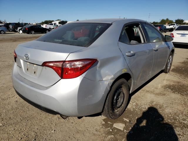 Photo 3 VIN: 5YFBURHE2HP647275 - TOYOTA COROLLA L 