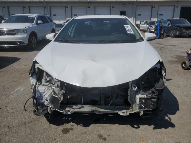 Photo 4 VIN: 5YFBURHE2HP648975 - TOYOTA COROLLA L 