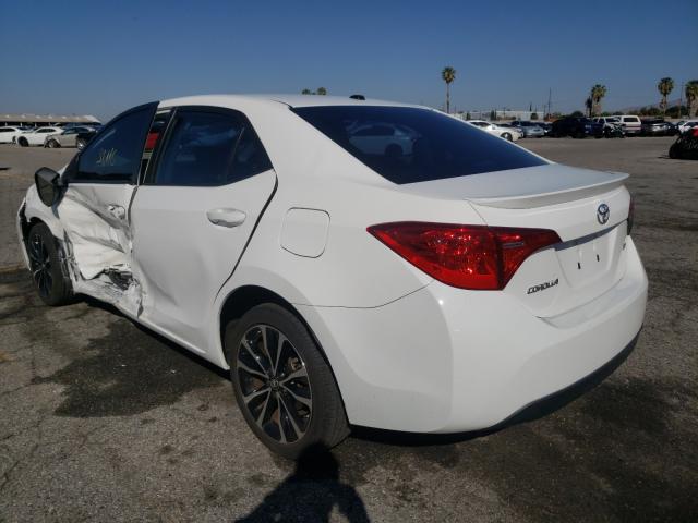 Photo 2 VIN: 5YFBURHE2HP649396 - TOYOTA COROLLA L 