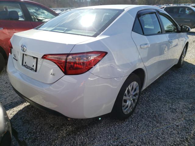 Photo 3 VIN: 5YFBURHE2HP687727 - TOYOTA COROLLA L 