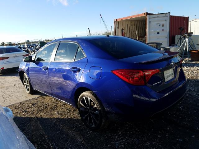 Photo 2 VIN: 5YFBURHE2HP689221 - TOYOTA COROLLA L 