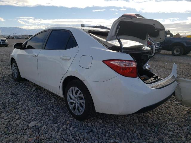 Photo 2 VIN: 5YFBURHE2HP693074 - TOYOTA COROLLA L 