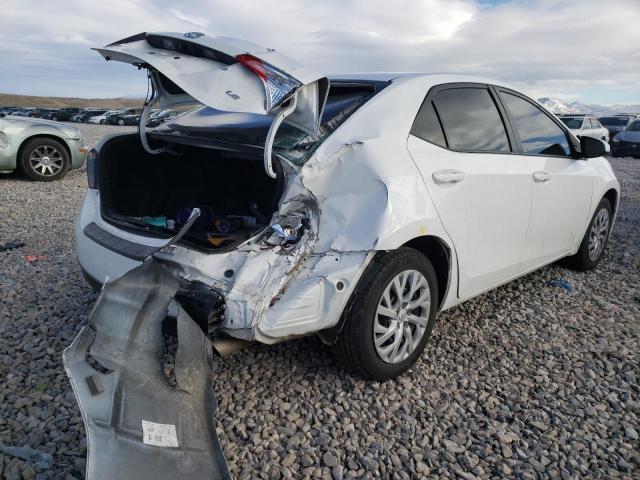 Photo 3 VIN: 5YFBURHE2HP693074 - TOYOTA COROLLA L 