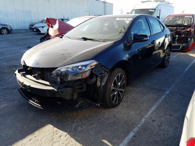 Photo 1 VIN: 5YFBURHE2HP695777 - TOYOTA COROLLA L 