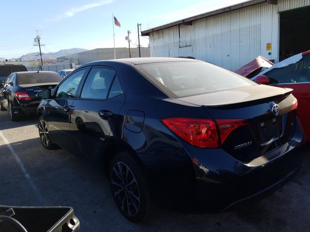 Photo 2 VIN: 5YFBURHE2HP695777 - TOYOTA COROLLA L 