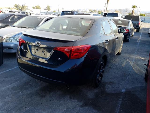 Photo 3 VIN: 5YFBURHE2HP695777 - TOYOTA COROLLA L 