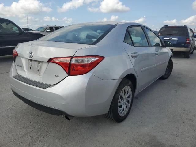 Photo 2 VIN: 5YFBURHE2HP696234 - TOYOTA COROLLA L 