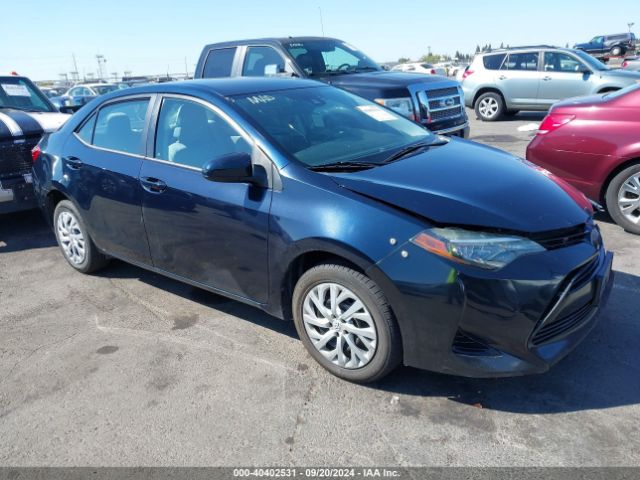 Photo 0 VIN: 5YFBURHE2HP697013 - TOYOTA COROLLA 