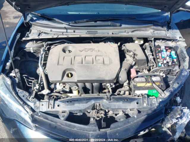 Photo 9 VIN: 5YFBURHE2HP697013 - TOYOTA COROLLA 