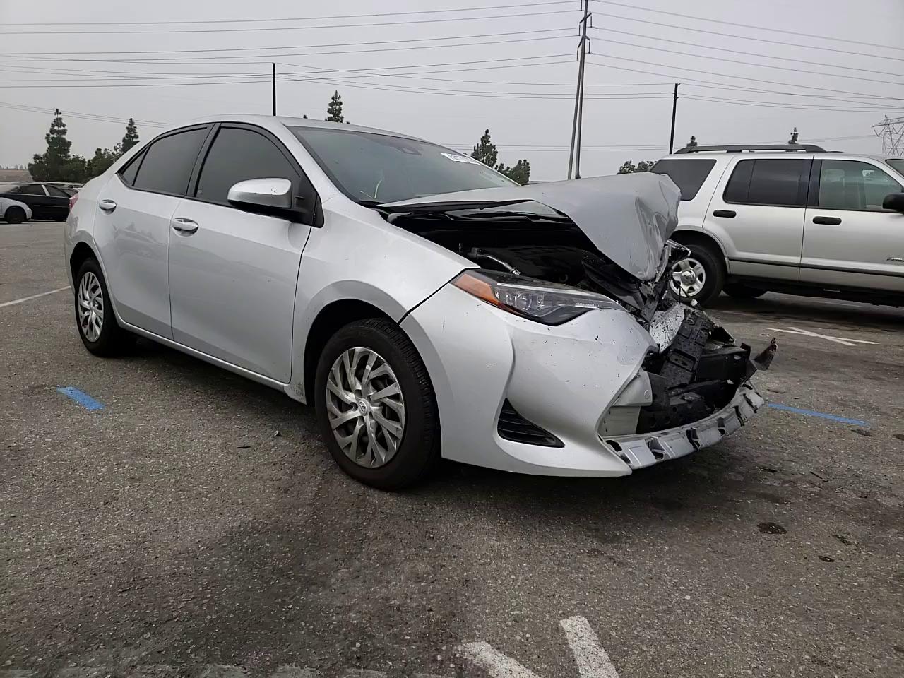 Photo 10 VIN: 5YFBURHE2HP697626 - TOYOTA COROLLA L 