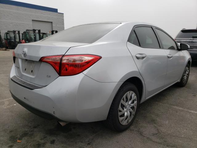 Photo 3 VIN: 5YFBURHE2HP697626 - TOYOTA COROLLA L 