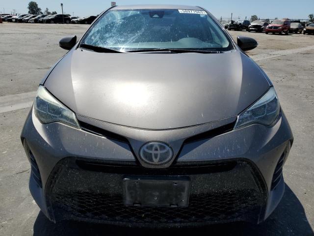 Photo 4 VIN: 5YFBURHE2HP698954 - TOYOTA COROLLA L 