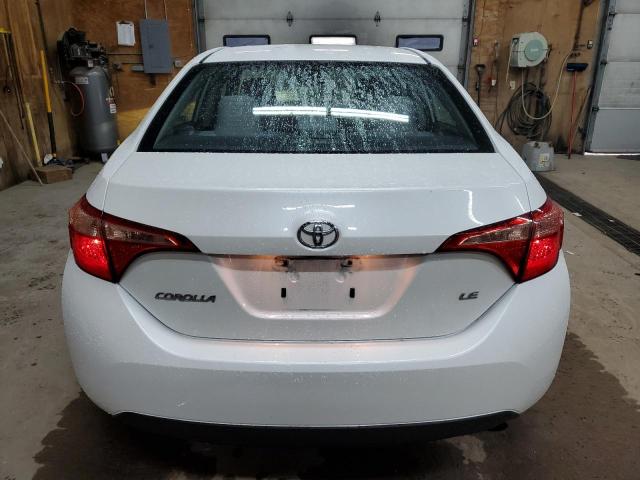 Photo 5 VIN: 5YFBURHE2HP708642 - TOYOTA COROLLA L 