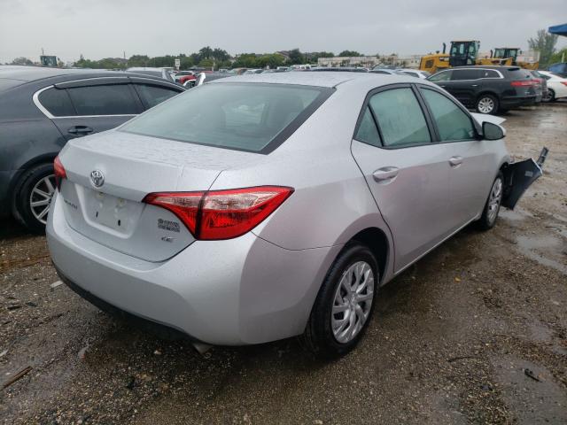 Photo 3 VIN: 5YFBURHE2HP729135 - TOYOTA COROLLA L 