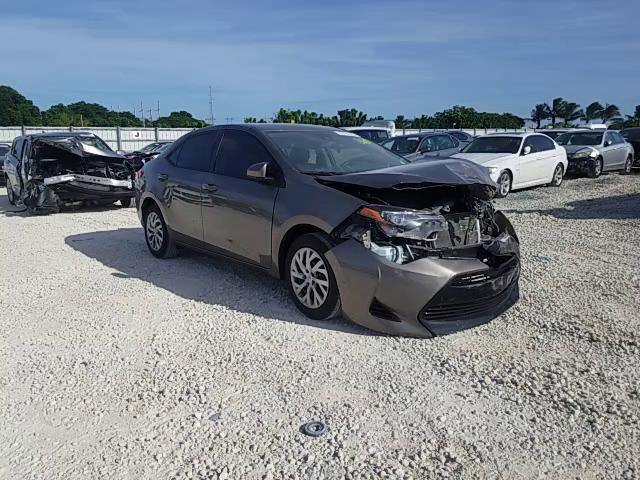 Photo 10 VIN: 5YFBURHE2JP739718 - TOYOTA COROLLA L 