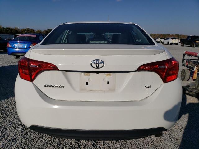 Photo 5 VIN: 5YFBURHE2JP769401 - TOYOTA COROLLA 