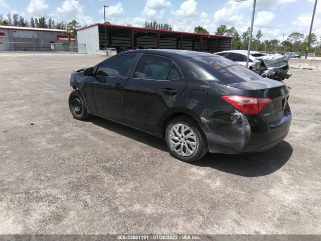 Photo 2 VIN: 5YFBURHE2JP770564 - TOYOTA COROLLA 