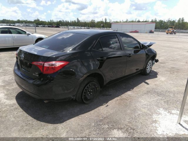 Photo 3 VIN: 5YFBURHE2JP770564 - TOYOTA COROLLA 