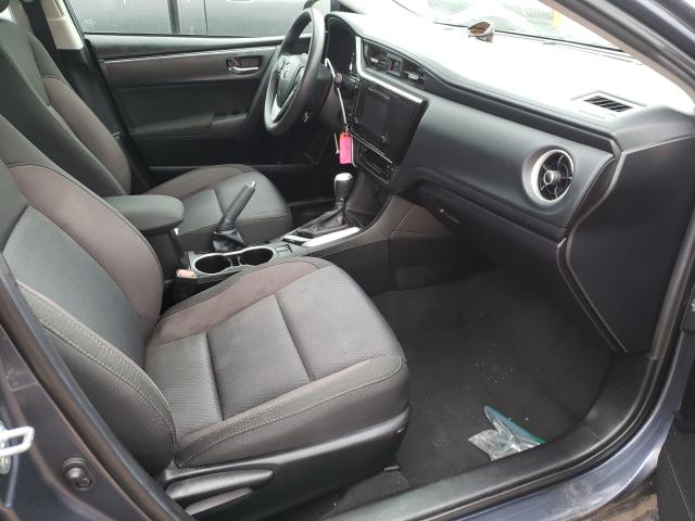 Photo 4 VIN: 5YFBURHE2JP776557 - TOYOTA COROLLA L 