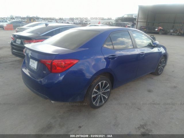 Photo 3 VIN: 5YFBURHE2JP779507 - TOYOTA COROLLA 