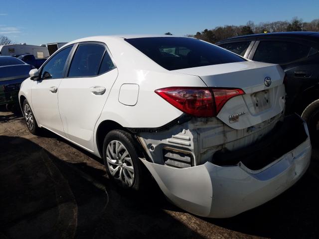 Photo 2 VIN: 5YFBURHE2JP780849 - TOYOTA COROLLA L 