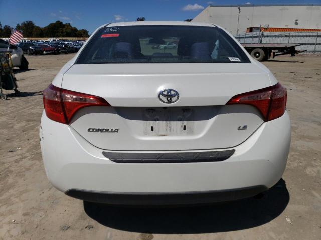 Photo 5 VIN: 5YFBURHE2JP813204 - TOYOTA COROLLA L 