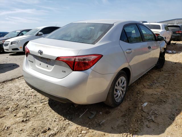 Photo 3 VIN: 5YFBURHE2JP833789 - TOYOTA COROLLA L 