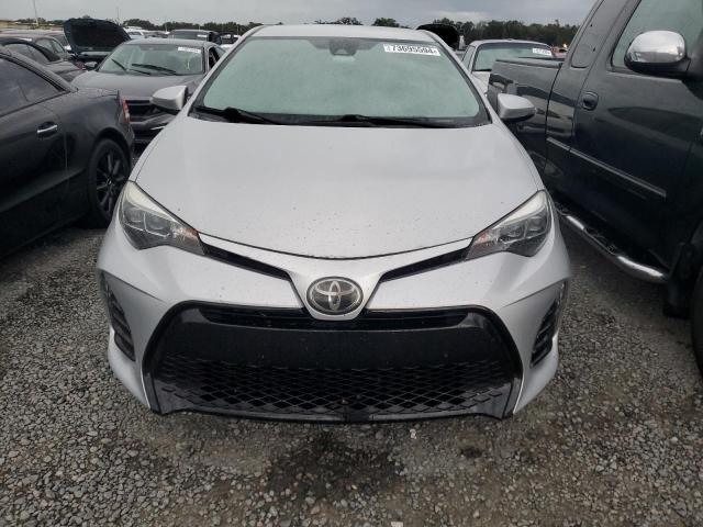 Photo 4 VIN: 5YFBURHE2KP863473 - TOYOTA COROLLA L 