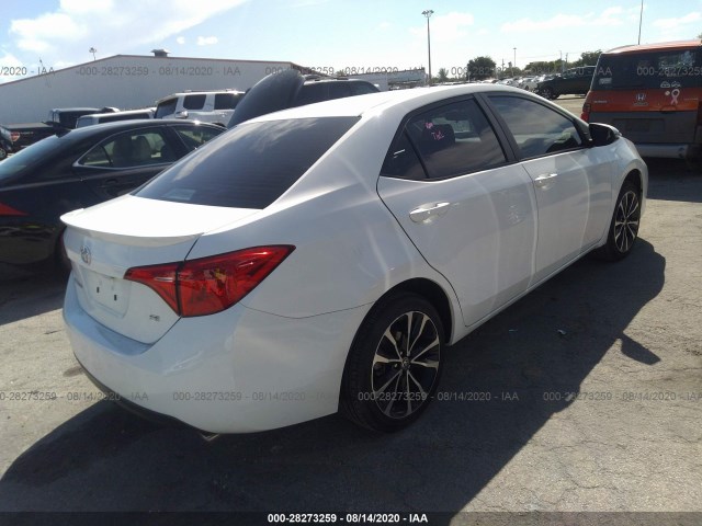 Photo 3 VIN: 5YFBURHE2KP865997 - TOYOTA COROLLA 