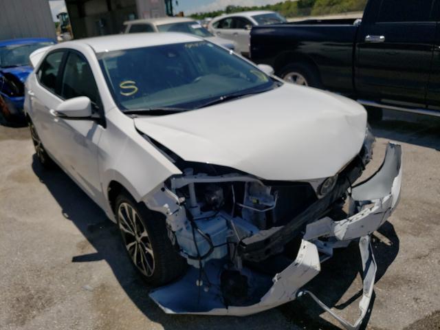 Photo 0 VIN: 5YFBURHE2KP867782 - TOYOTA COROLLA L 