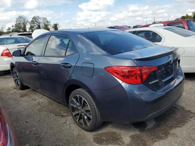 Photo 2 VIN: 5YFBURHE2KP868589 - TOYOTA COROLLA L 