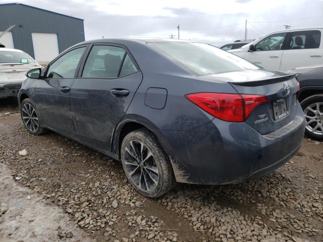 Photo 2 VIN: 5YFBURHE2KP870424 - TOYOTA COROLLA L 