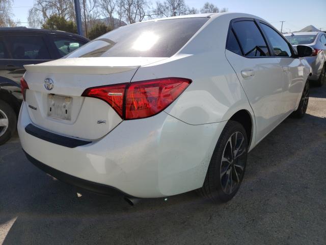 Photo 3 VIN: 5YFBURHE2KP872206 - TOYOTA COROLLA L 