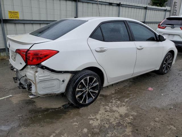 Photo 2 VIN: 5YFBURHE2KP873663 - TOYOTA COROLLA L 