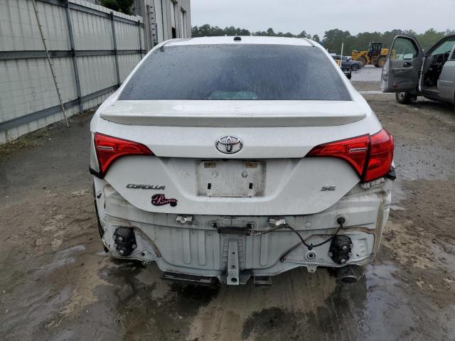 Photo 5 VIN: 5YFBURHE2KP873663 - TOYOTA COROLLA L 