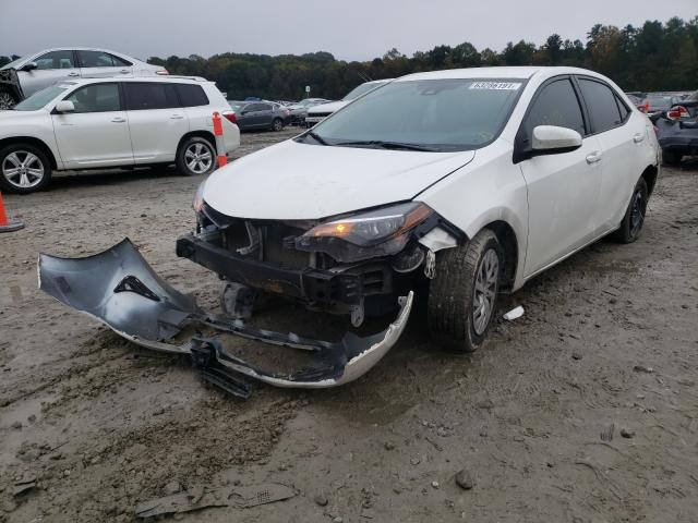 Photo 1 VIN: 5YFBURHE2KP874327 - TOYOTA COROLLA L 