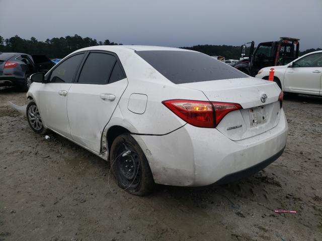 Photo 2 VIN: 5YFBURHE2KP874327 - TOYOTA COROLLA L 