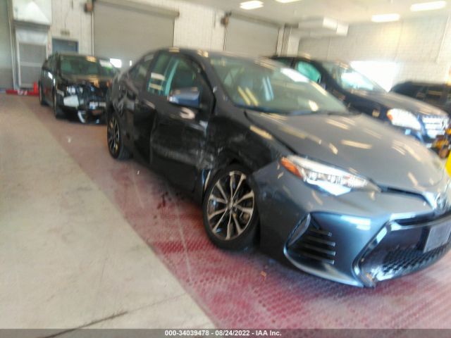 Photo 5 VIN: 5YFBURHE2KP874974 - TOYOTA COROLLA 