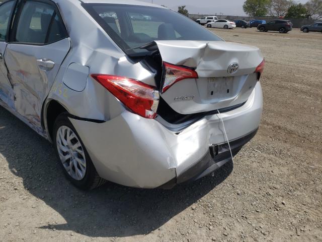 Photo 9 VIN: 5YFBURHE2KP875364 - TOYOTA COROLLA L 